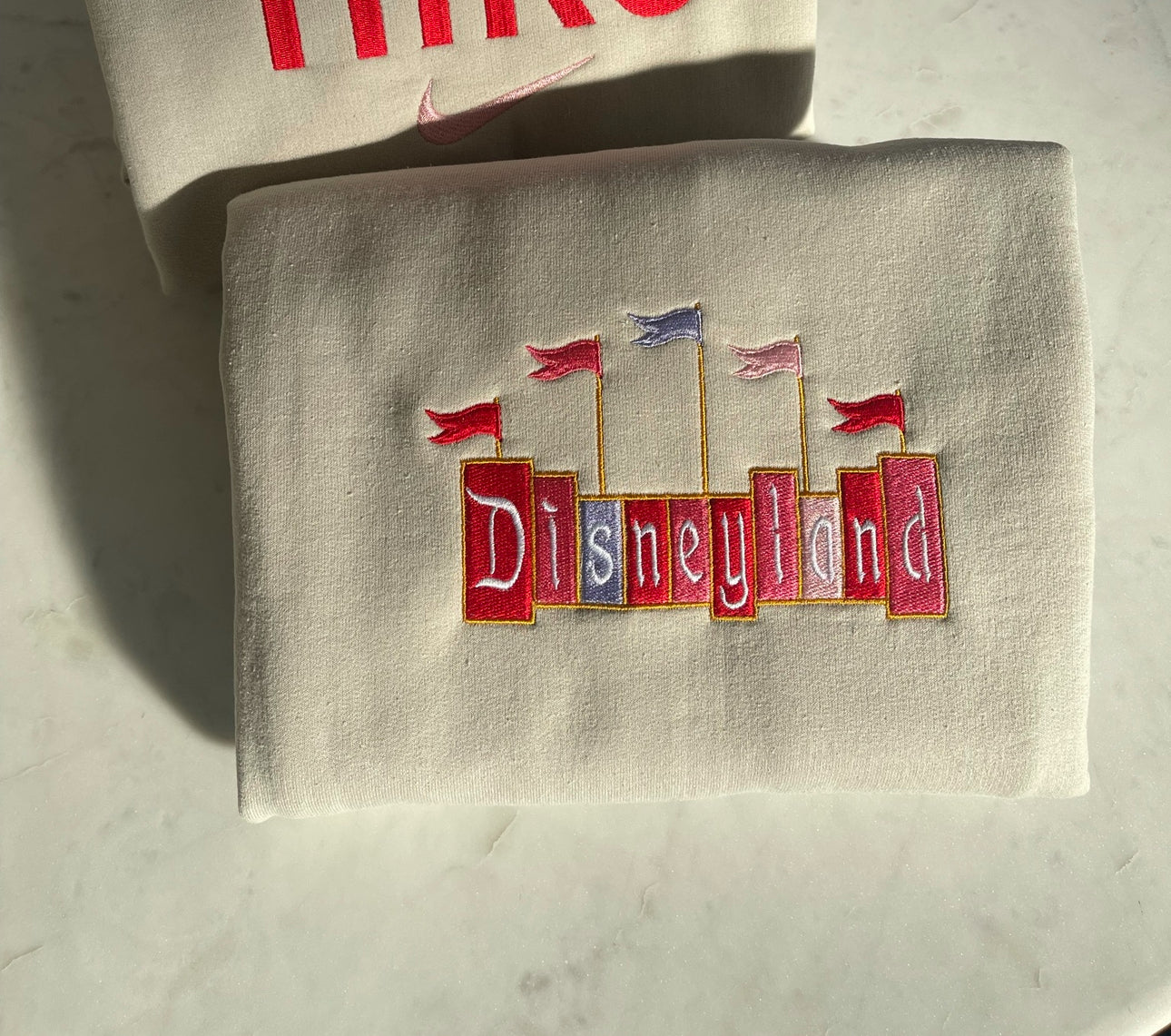 Carousel embroidered crewneck